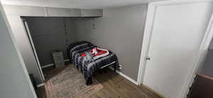 Bedroom with wood finished floors