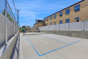 Surrounding community with a tennis court