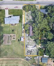 Aerial overview of property's location with property parcel outlined
