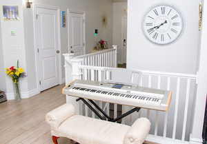 Detailed view of wood finished floors and baseboards