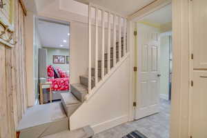 Stairway featuring tile patterned flooring