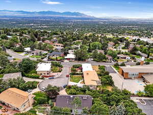 Aerial view of residential area featuring a mountain backdrop