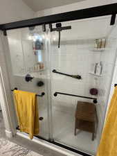 Bathroom featuring a stall shower