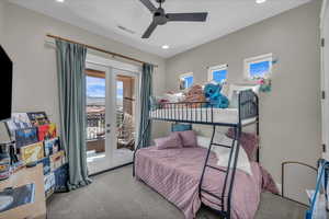Carpeted bedroom with french doors, access to outside, recessed lighting, and ceiling fan