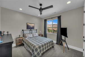 Bedroom with carpet flooring, recessed lighting, and ceiling fan