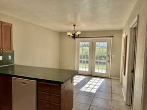 Kitchen and dining area with both space and function in mind with ample space for a table