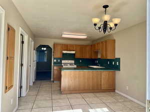 The kitchen and dining area are thoughtfully designed with space and function in mind