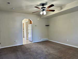 Spacious living room adjacent to the kitchen and dining which make the room feel open and airy