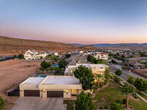 Aerial view at dusk of a residential view and a mountain view