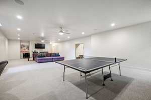 Playroom with light colored carpet, recessed lighting, and ceiling fan