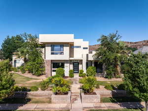 View of front of house with stucco siding