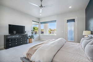 Bedroom featuring carpet flooring, recessed lighting, and a ceiling fan