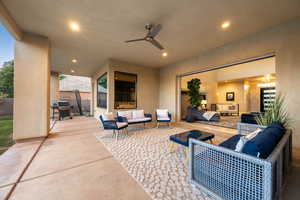 View of patio / terrace with outdoor lounge area, grilling area, and ceiling fan