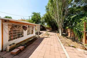 View of backyard and bistro area