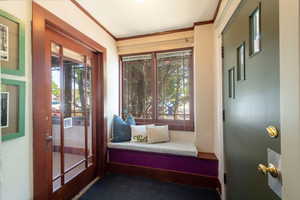 Foyer area - with doors into either sun room area or main entry into home and dining area
