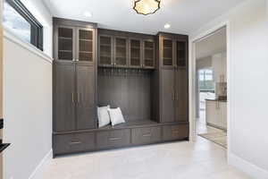 Mudroom featuring light tile patterned floors and recessed lighting