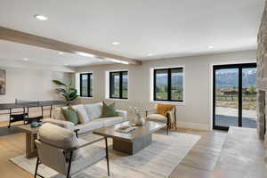 Living room with recessed lighting, light wood finished floors, a mountain view, and beam ceiling