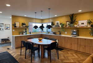Dining space with recessed lighting