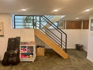 Stairs featuring carpet flooring and recessed lighting