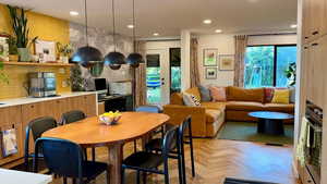 Dining room featuring recessed lighting