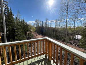 Balcony with a view of trees