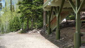 View of yard featuring stairs