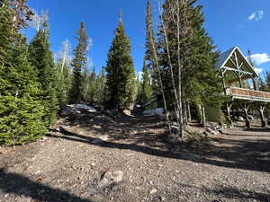 View of yard featuring a deck