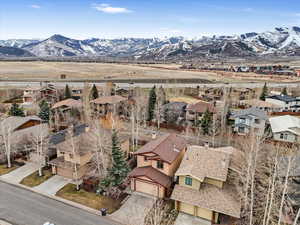 Aerial perspective of suburban area featuring mountains