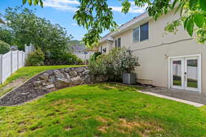 View of yard with french doors
