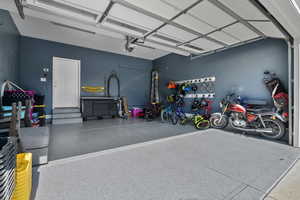 Garage featuring a garage door opener