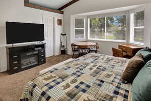 Bedroom with carpet flooring and baseboards