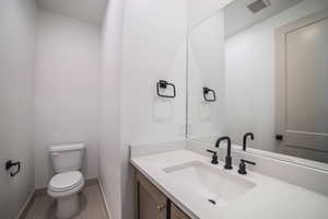 Bathroom with vanity and tile patterned floors