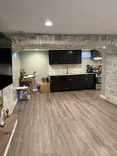 Living area with light wood-style floors