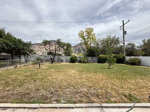 View of fenced backyard