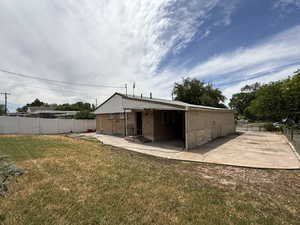 Rear view of property with a patio and entry steps
