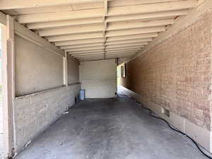 View of patio featuring a carport
