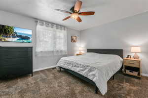 Bedroom with carpet floors and ceiling fan