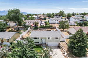Aerial view of residential area with mountains