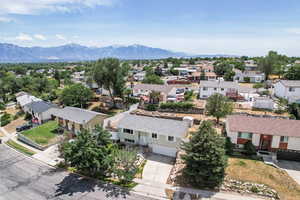 Aerial view of residential area with a mountainous background