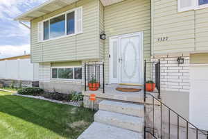 Property entrance featuring a garage