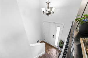 Entryway featuring a chandelier