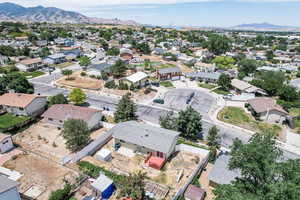 Aerial perspective of suburban area featuring mountains
