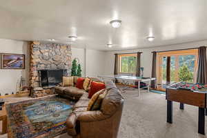 Downstairs living, TV and game room with walk-out