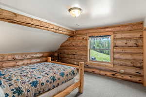Bedroom #3 upstairs with view of forest