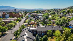 Aerial view of residential area featuring mountains