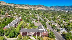 Aerial view of residential area featuring a mountain backdrop