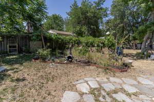 View of yard featuring a vegetable garden