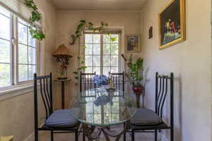 Dining room featuring plenty of natural light and tile patterned floors
