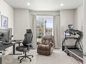 Home office featuring carpet flooring and recessed lighting