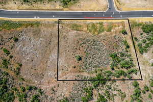 Aerial view of property's location with property parcel outlined